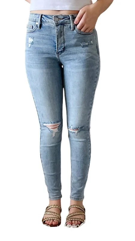 Mid Rise Tummy Control Distressed Jeans In Light Wash